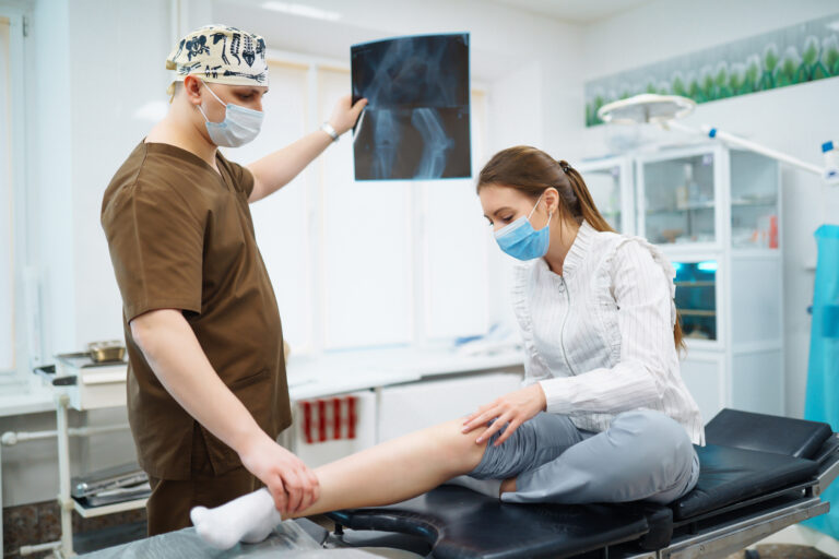 Doctor examines x-ray of patient leg Foot and sprain concept Sport exercise injuries - Staffdna Orthopedic Assistant Jobs, Orthopedic Assistant, Travel Jobs, Local Jobs, Staff Jobs, Per Diem Jobs