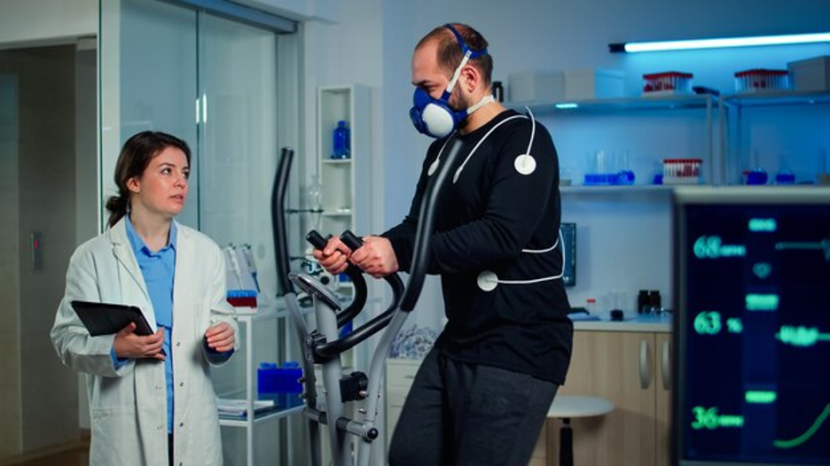 Female Respiratory Therapist helping patient with breathing tests