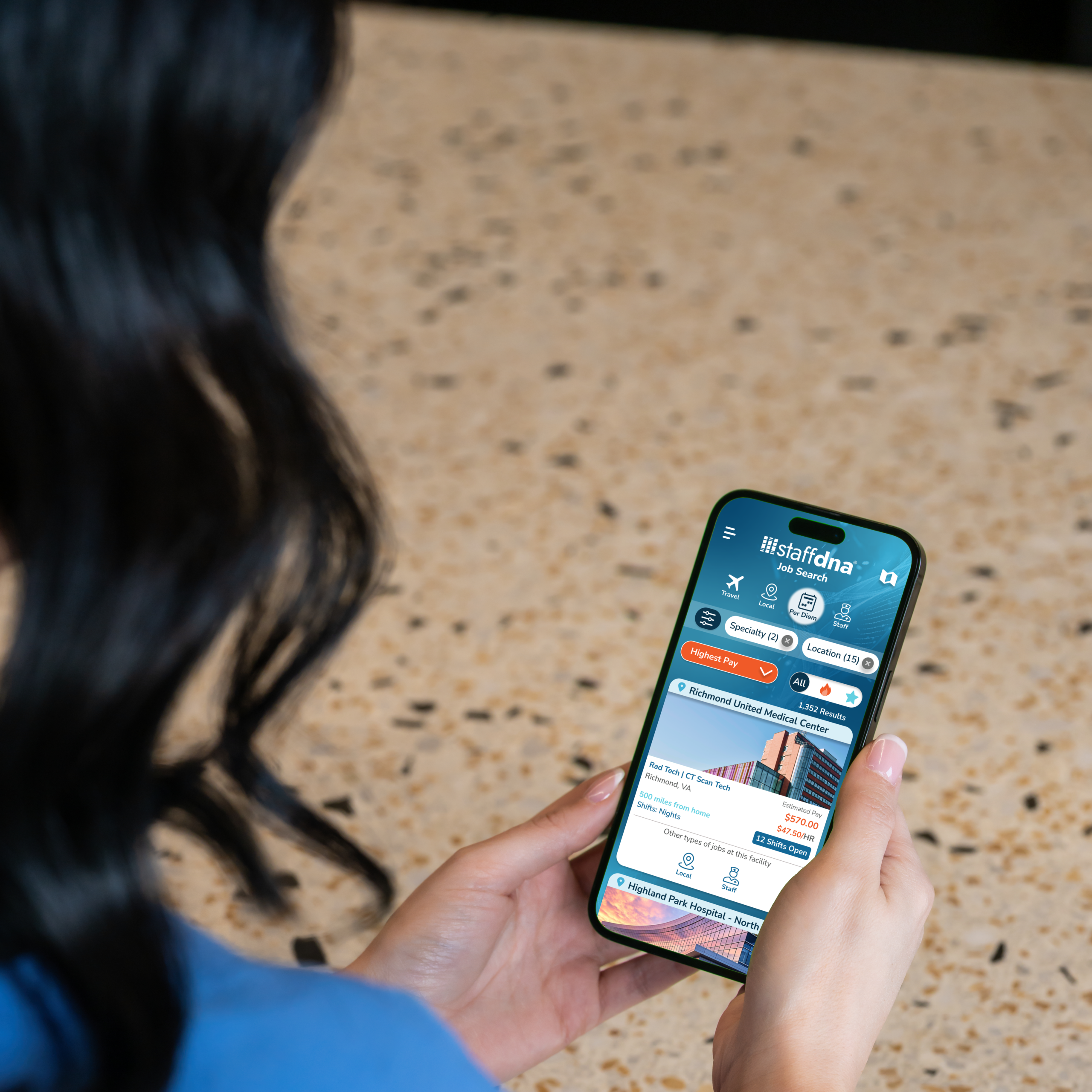 Female allied nurse looking at per diem jobs in the StaffDNA mobile app.