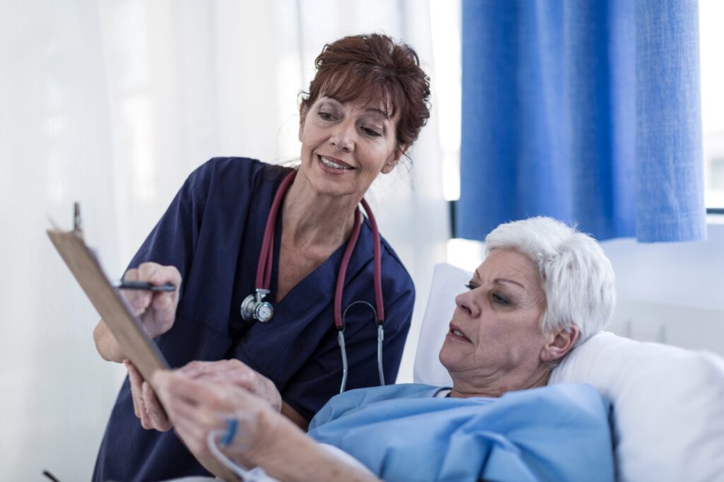 Doctor explaining patient advance directive